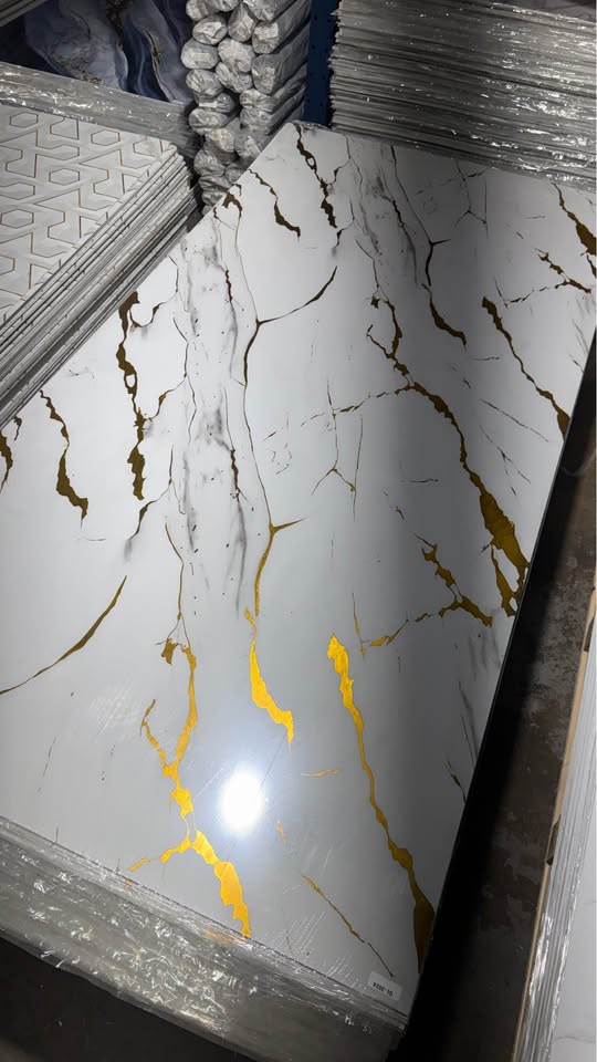 Golden Elegant Marble Look PVC Wall Panel – 4x8 ft UV Coated, Waterproof & Fire Rated (32 sq. ft) (Copy)